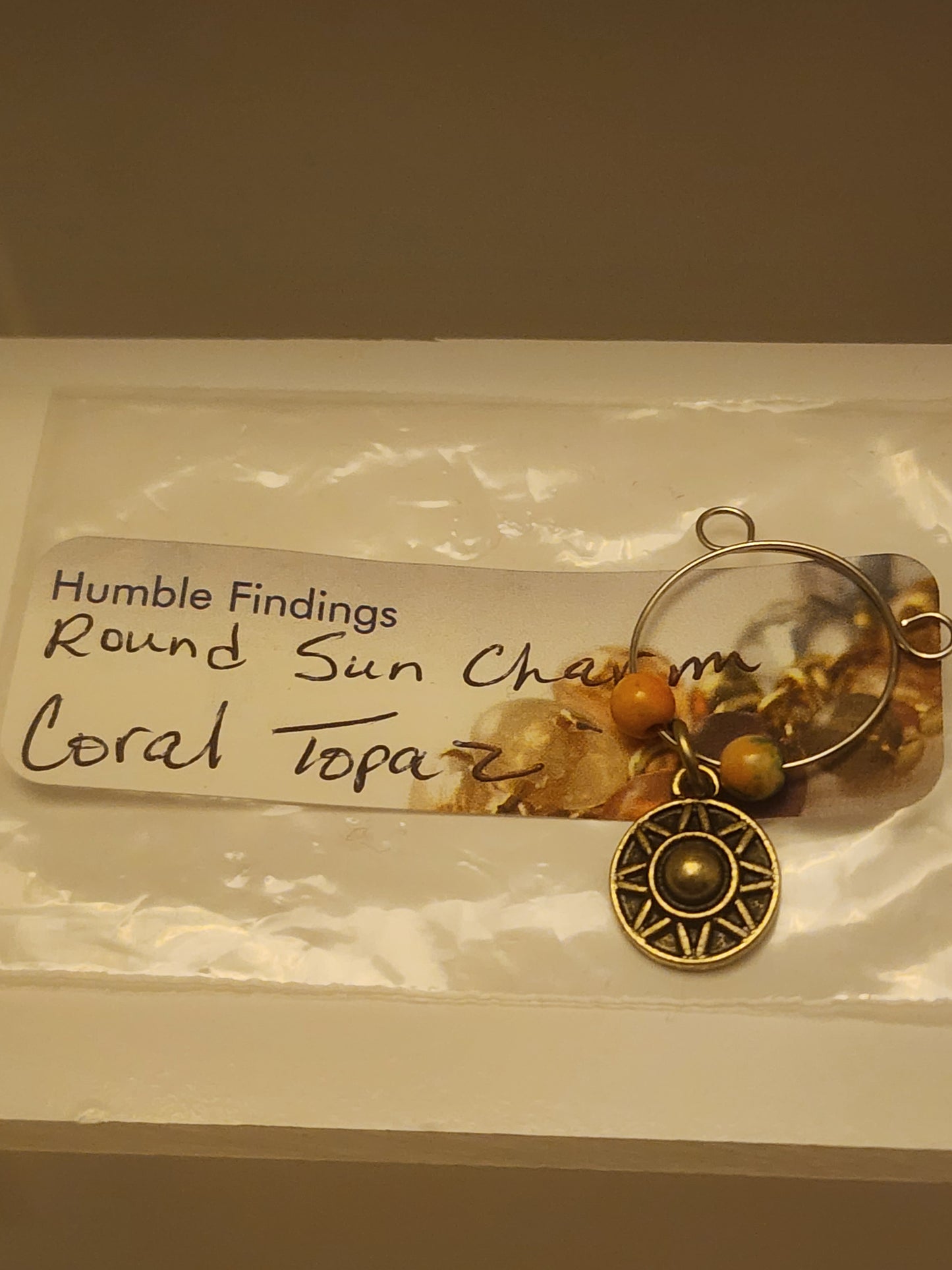 Round Sun Charm Wine Ring
