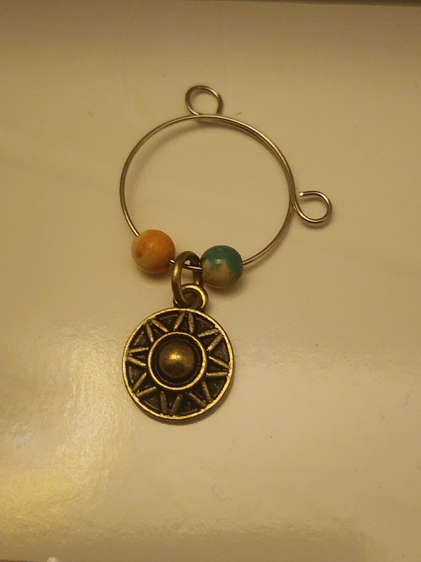 Round Sun Charm Wine Ring